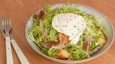 Frisee sald with duck confit and poached egg