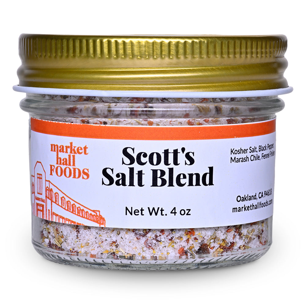 4 ounce jar of Scott's Salt Blend sealed with a gold cap on a white background