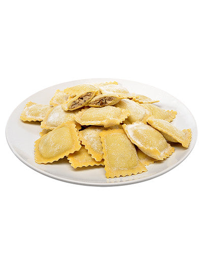 Fresh ravioli on a white plate