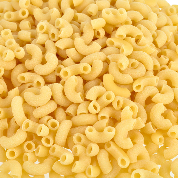 Close up of dried elbow-shaped macaroni pasta